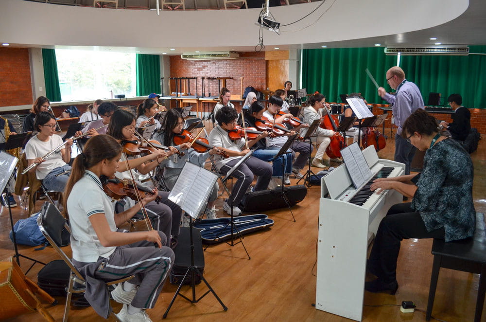 A teacher in the music class